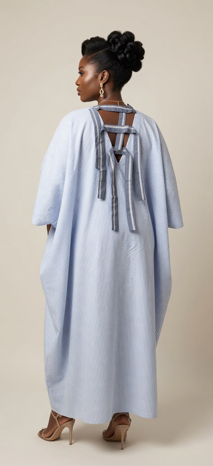 Adebanke Boubou – Light Blue Flowing Dress with Royal Blue Pocket & Stylish Back Design